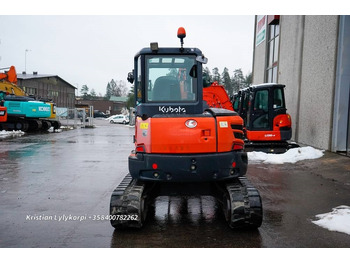Mini ekskavatör Kubota U48-4 kallistajalla: fotoğraf 4