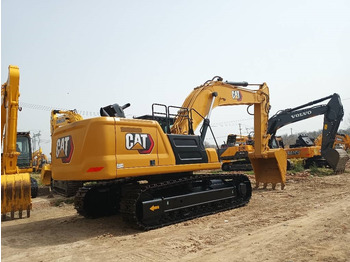 Paletli ekskavatör CATERPILLAR