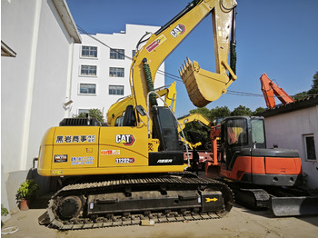 Paletli ekskavatör CATERPILLAR