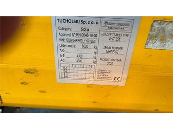 Tabla römorku New Holland 4 hjulet skærebordsvogn: fotoğraf 3 Tabla römorku New Holland 4 hjulet skærebordsvogn: fotoğraf 3