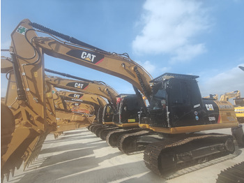 Paletli ekskavatör CATERPILLAR
