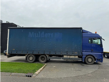 Tenteli kamyon MAN TGX 26.400 6X2 - EURO 4 + LIFT + STEERING AXLE +: fotoğraf 4