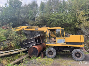 Tekerlekli ekskavatör CATERPILLAR
