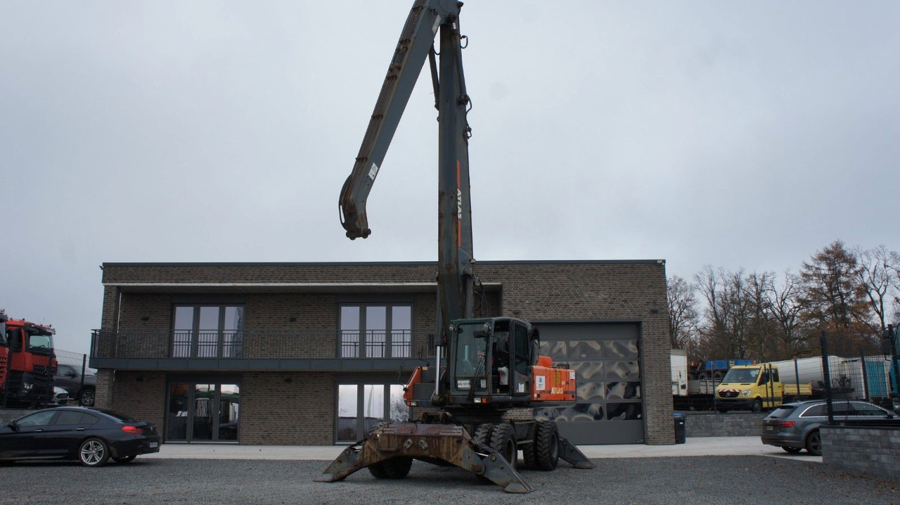 Atlas 350 MH Mobilbagger Umschlagbagger Pratzen - Tekerlekli ekskavatör: fotoğraf 1 Atlas 350 MH Mobilbagger Umschlagbagger Pratzen - Tekerlekli ekskavatör: fotoğraf 1