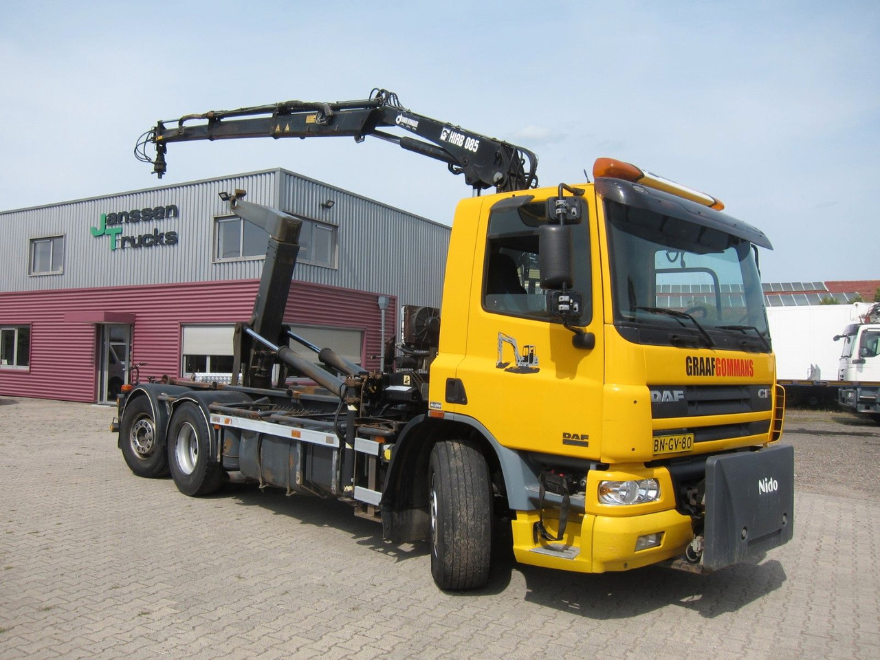 DAF CF 75 310 6X2*4 Hiab Kran Haken Manual Funk E3 - Kancalı yükleyici kamyon, Vinçli kamyon: fotoğraf 1 DAF CF 75 310 6X2*4 Hiab Kran Haken Manual Funk E3 - Kancalı yükleyici kamyon, Vinçli kamyon: fotoğraf 1