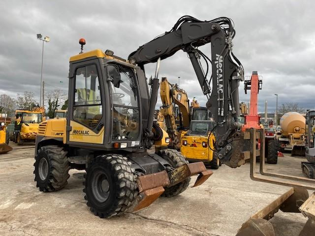 Mecalac 12 MTX - Tekerlekli ekskavatör: fotoğraf 1 Mecalac 12 MTX - Tekerlekli ekskavatör: fotoğraf 1