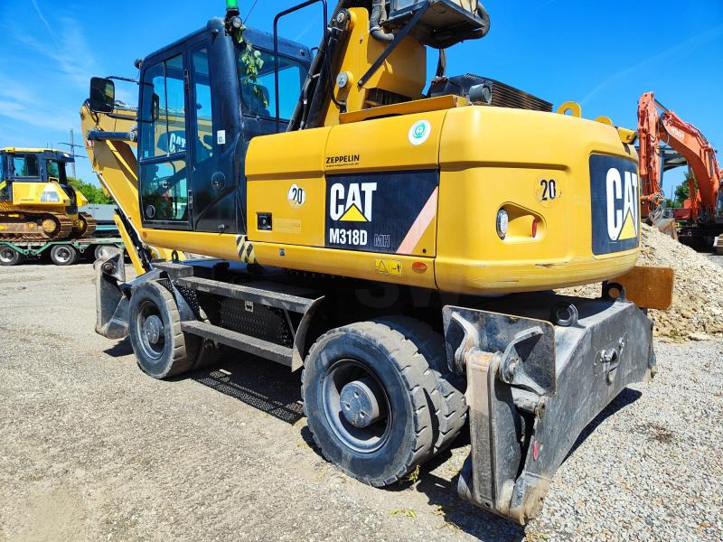 Caterpillar M318D MH - Elleçleme makinesi: fotoğraf 1 Caterpillar M318D MH - Elleçleme makinesi: fotoğraf 1