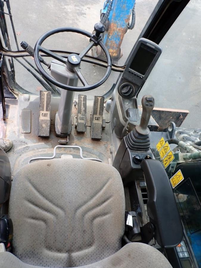 Caterpillar M322D - Tekerlekli ekskavatör: fotoğraf 5 Caterpillar M322D - Tekerlekli ekskavatör: fotoğraf 5