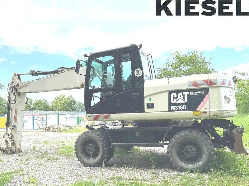 CAT M 316 D - Tekerlekli ekskavatör: fotoğraf 1 CAT M 316 D - Tekerlekli ekskavatör: fotoğraf 1