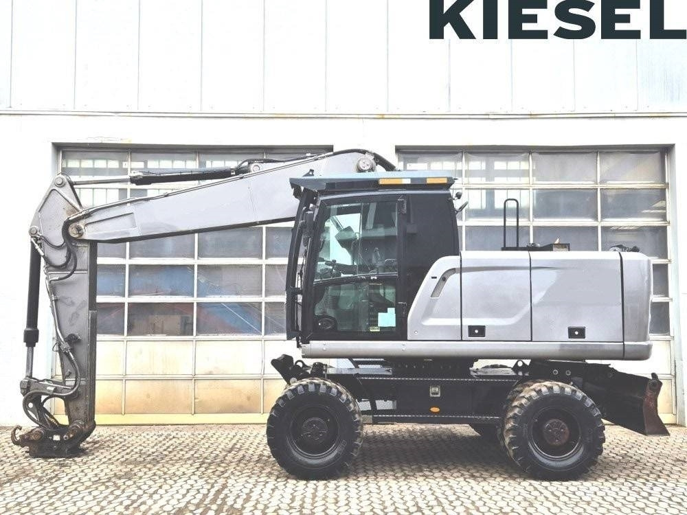 CAT M 320 F - Tekerlekli ekskavatör: fotoğraf 1 CAT M 320 F - Tekerlekli ekskavatör: fotoğraf 1