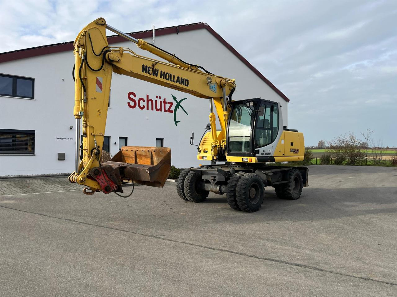 New Holland MH 5.6 inkl. Grabenlöffel, Tieflöffel - Tekerlekli ekskavatör: fotoğraf 1 New Holland MH 5.6 inkl. Grabenlöffel, Tieflöffel - Tekerlekli ekskavatör: fotoğraf 1