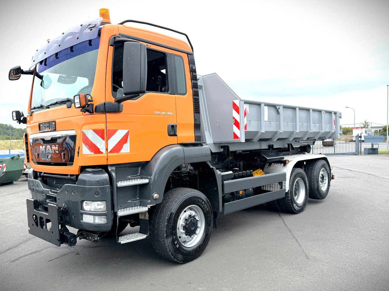 MAN TGS 28.360 6x4-4BL Meiller RK20.55 Winterdienst - Kancalı yükleyici kamyon: fotoğraf 1 MAN TGS 28.360 6x4-4BL Meiller RK20.55 Winterdienst - Kancalı yükleyici kamyon: fotoğraf 1