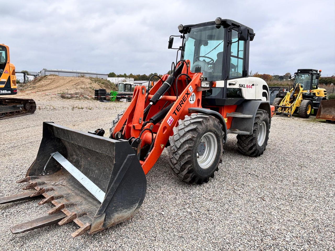 TEREX TL 100 - Tekerlekli yükleyici: fotoğraf 1 TEREX TL 100 - Tekerlekli yükleyici: fotoğraf 1