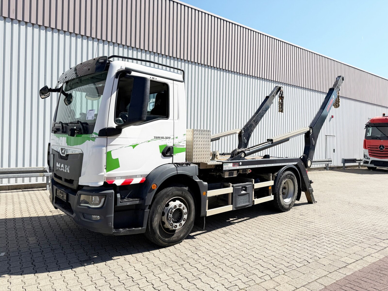 MAN TGM 18.320 4x2 BL TGM 18.320 4x2 BL, Hiab Tele-Absetzanlage, Funk - Hidrolift kamyon: fotoğraf 1 MAN TGM 18.320 4x2 BL TGM 18.320 4x2 BL, Hiab Tele-Absetzanlage, Funk - Hidrolift kamyon: fotoğraf 1