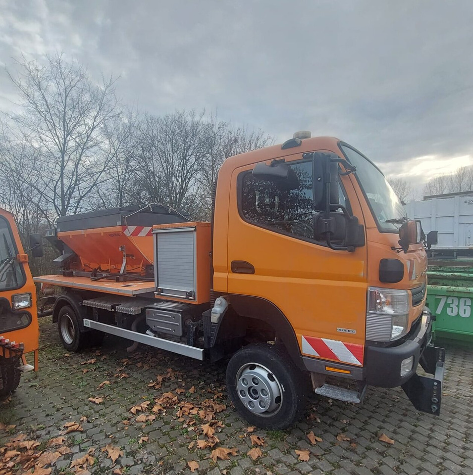 Mitsubishi Canter Fuso 6C18 4x4 Canter Fuso 6C18 4x4, Winterdienstausstattung, AJK HL 5-3.150 City-Abroller - Kancalı yükleyici kamyon: fotoğraf 1 Mitsubishi Canter Fuso 6C18 4x4 Canter Fuso 6C18 4x4, Winterdienstausstattung, AJK HL 5-3.150 City-Abroller - Kancalı yükleyici kamyon: fotoğraf 1