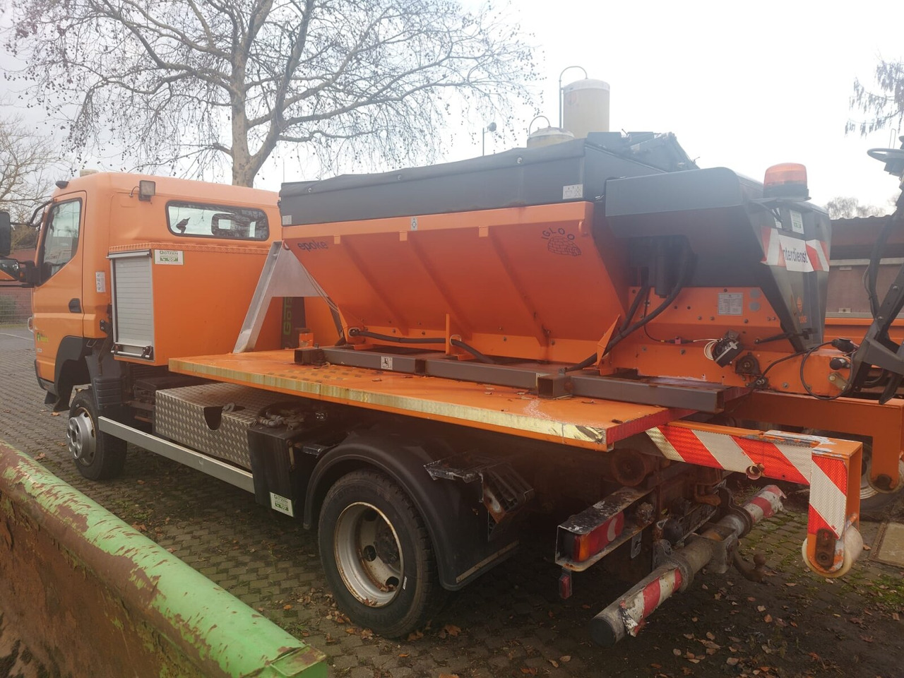 Mitsubishi Canter Fuso 6C18 4x4 Canter Fuso 6C18 4x4, Winterdienstausstattung, AJK HL 5-3.150 City-Abroller - Kancalı yükleyici kamyon: fotoğraf 3 Mitsubishi Canter Fuso 6C18 4x4 Canter Fuso 6C18 4x4, Winterdienstausstattung, AJK HL 5-3.150 City-Abroller - Kancalı yükleyici kamyon: fotoğraf 3