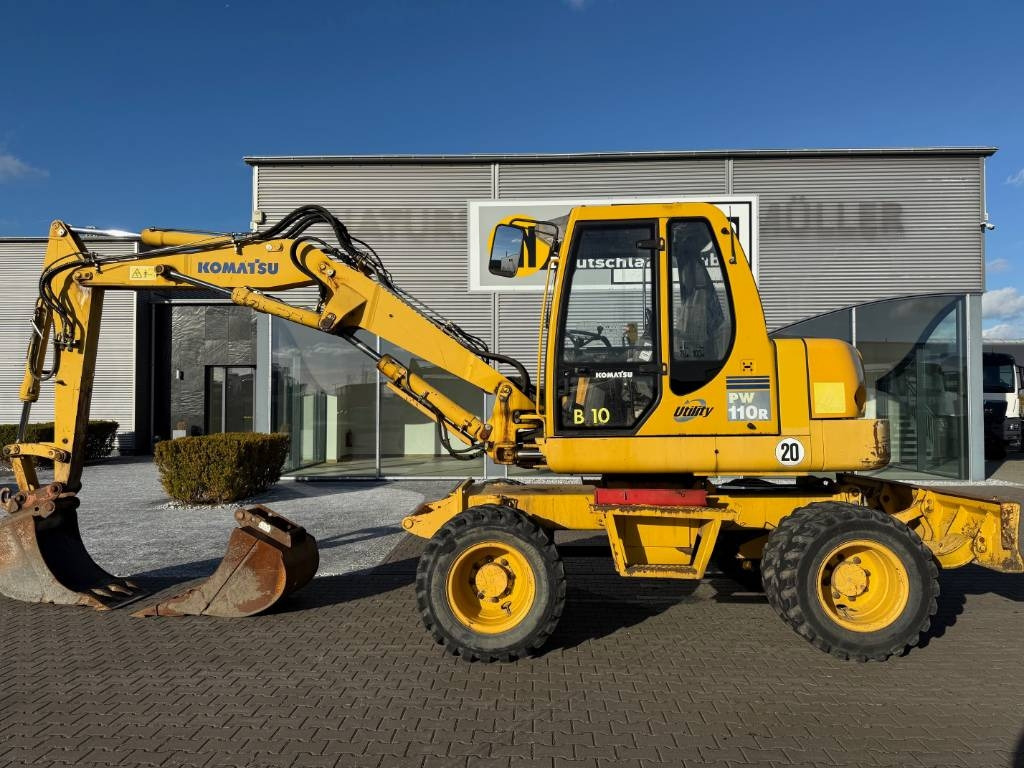 Komatsu PW 110 - Tekerlekli ekskavatör: fotoğraf 1 Komatsu PW 110 - Tekerlekli ekskavatör: fotoğraf 1