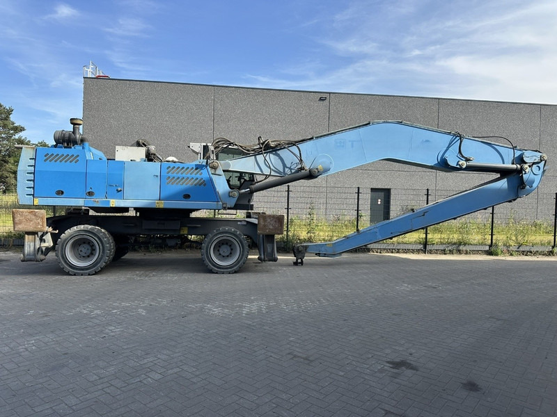 Fuchs MHL 360 OVERSLAGKRAAN / MATERIAL HANDLER / UMSCHLAGBAGGER - TOP ZUSTAND - Elleçleme makinesi: fotoğraf 1 Fuchs MHL 360 OVERSLAGKRAAN / MATERIAL HANDLER / UMSCHLAGBAGGER - TOP ZUSTAND - Elleçleme makinesi: fotoğraf 1
