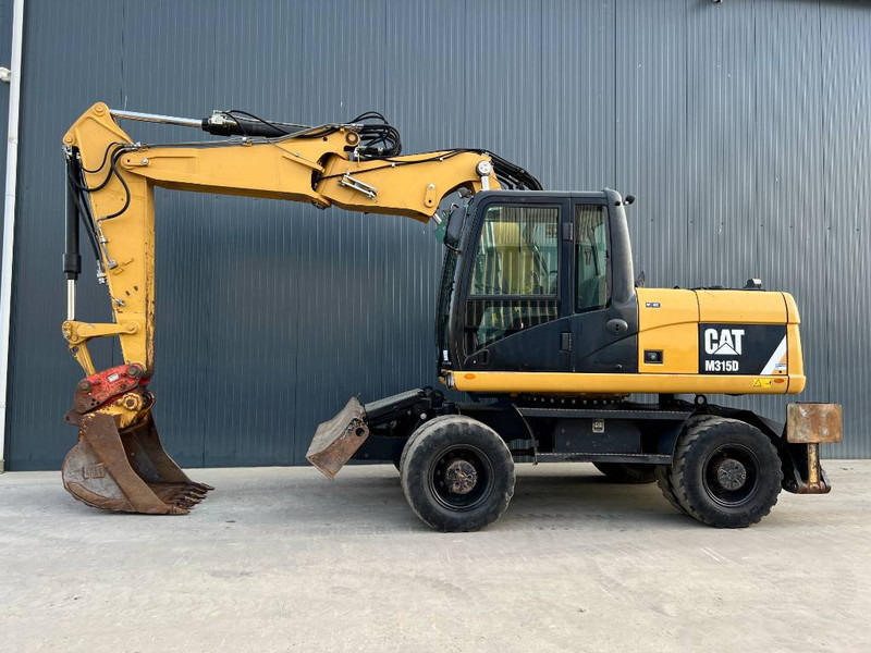 Cat M315D - Tekerlekli ekskavatör: fotoğraf 3 Cat M315D - Tekerlekli ekskavatör: fotoğraf 3