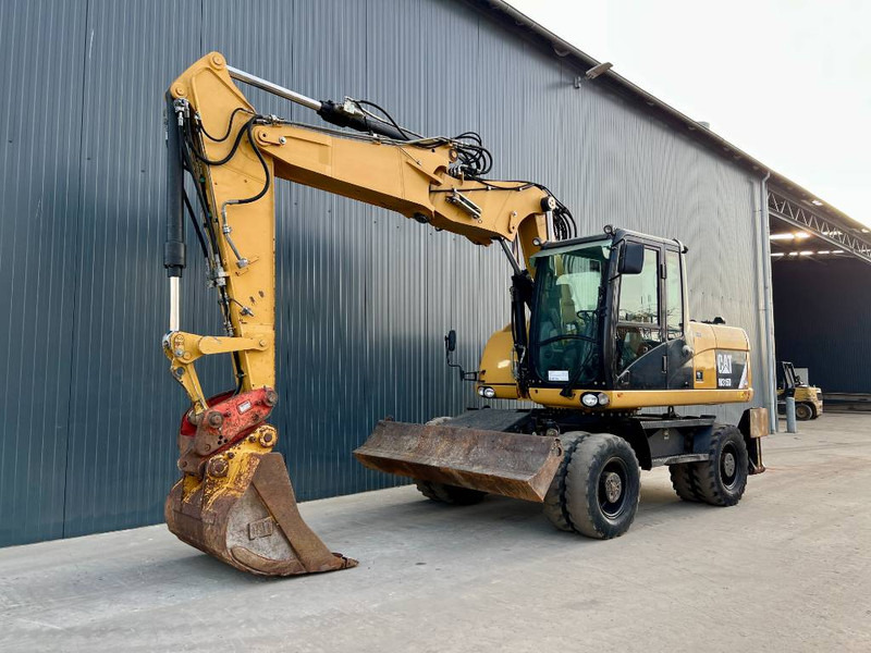 Cat M315D - Tekerlekli ekskavatör: fotoğraf 2 Cat M315D - Tekerlekli ekskavatör: fotoğraf 2