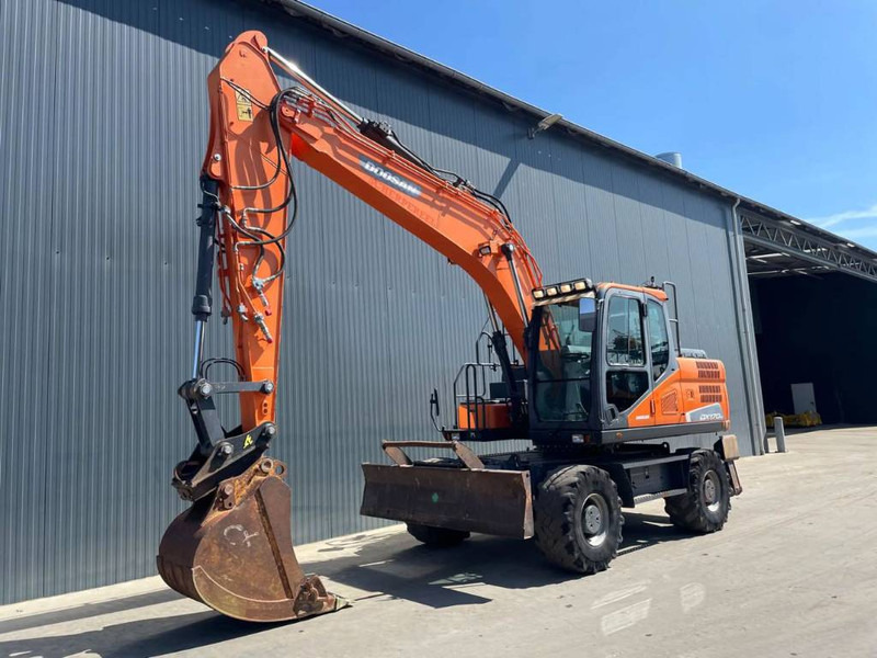 Doosan DX170W-5 - Tekerlekli ekskavatör: fotoğraf 1 Doosan DX170W-5 - Tekerlekli ekskavatör: fotoğraf 1