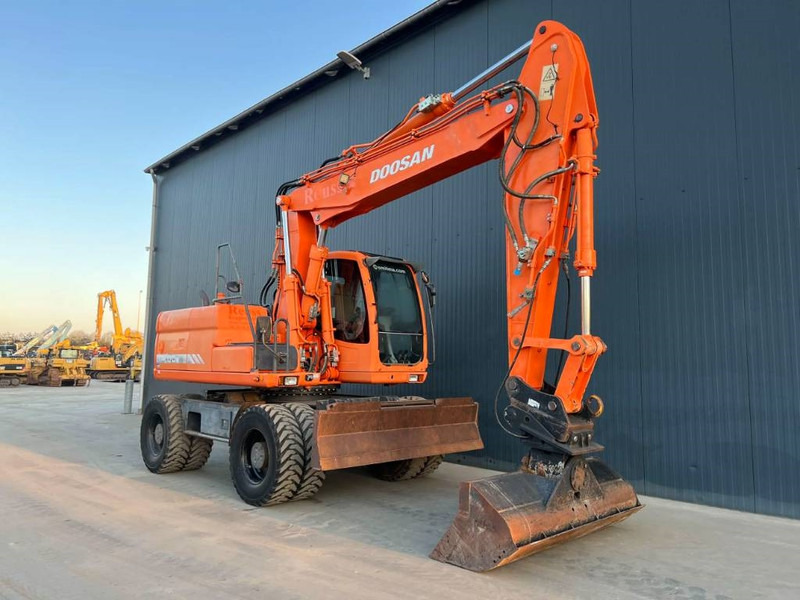 Doosan DX170W - Tekerlekli ekskavatör: fotoğraf 2 Doosan DX170W - Tekerlekli ekskavatör: fotoğraf 2