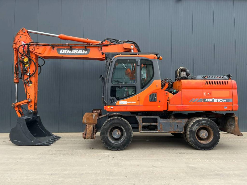 Doosan DX210W - Tekerlekli ekskavatör: fotoğraf 5 Doosan DX210W - Tekerlekli ekskavatör: fotoğraf 5