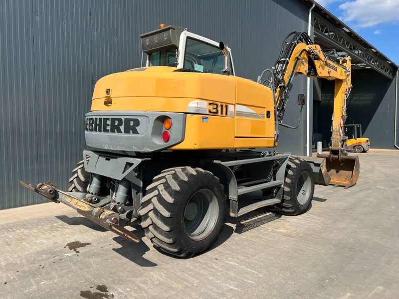 Liebherr A311 Litronic - Tekerlekli ekskavatör: fotoğraf 4 Liebherr A311 Litronic - Tekerlekli ekskavatör: fotoğraf 4