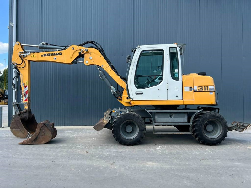 Liebherr A311 Litronic - Tekerlekli ekskavatör: fotoğraf 5 Liebherr A311 Litronic - Tekerlekli ekskavatör: fotoğraf 5