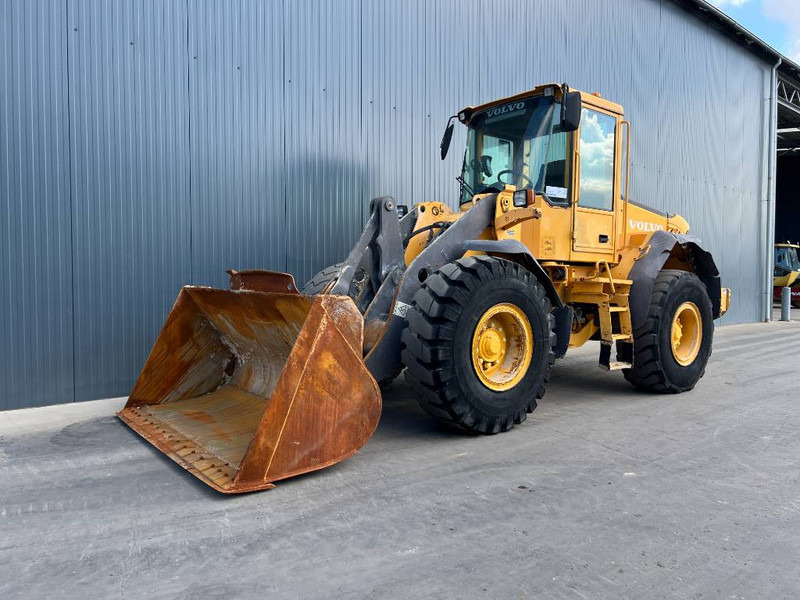 Volvo L60E - Tekerlekli yükleyici: fotoğraf 1 Volvo L60E - Tekerlekli yükleyici: fotoğraf 1