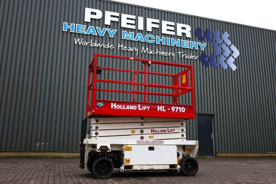 Holland Lift Ecostar HL-9710 Electric, 12m Working Height, 325k - Makasli platform: fotoğraf 1 Holland Lift Ecostar HL-9710 Electric, 12m Working Height, 325k - Makasli platform: fotoğraf 1