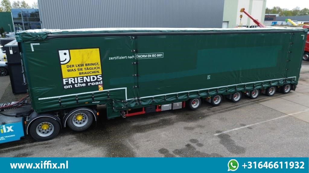 Meusburger 6-ass. Semi dieplader met elektrische huifopbouw / 3x naloop gestuurd - Alçak çerçeveli platform dorse: fotoğraf 1 Meusburger 6-ass. Semi dieplader met elektrische huifopbouw / 3x naloop gestuurd - Alçak çerçeveli platform dorse: fotoğraf 1