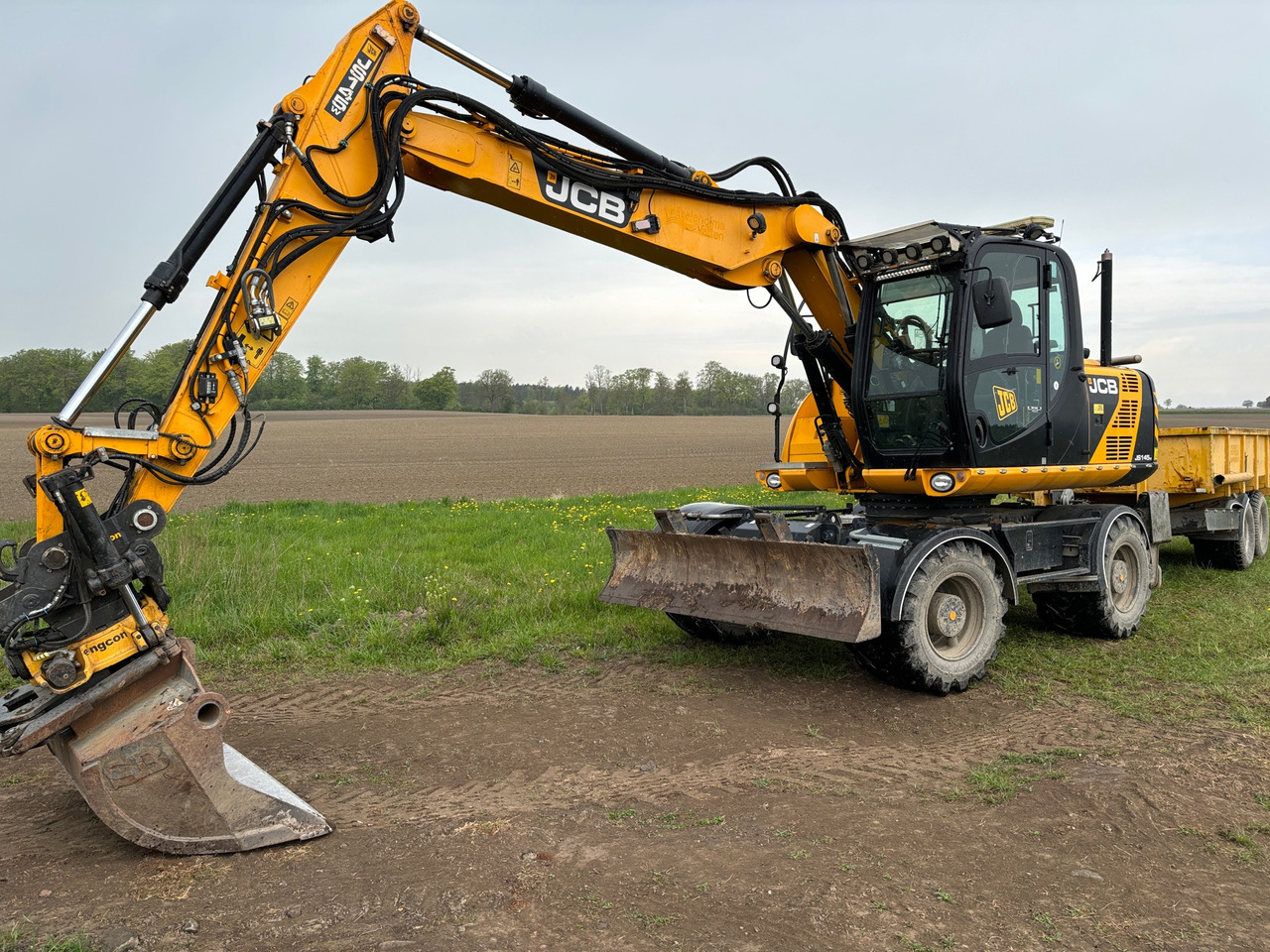 JCB JS145W - Ekskavatör: fotoğraf 1 JCB JS145W - Ekskavatör: fotoğraf 1