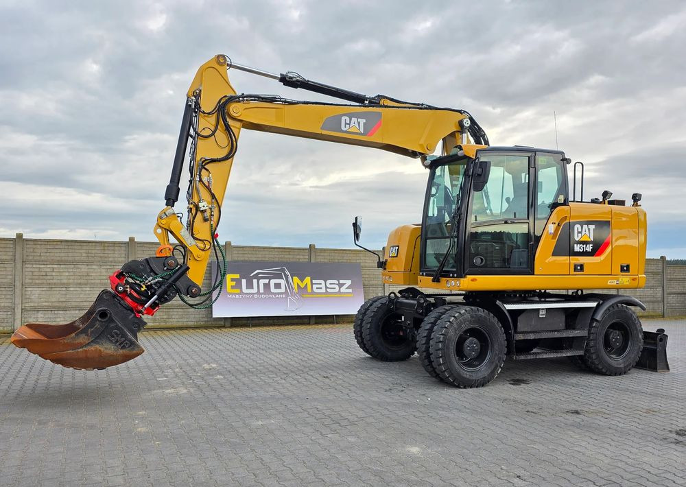 Caterpillar M314F, 2016 ROK, GŁOWICA ROTOTILT, 4400 MTH - Tekerlekli ekskavatör: fotoğraf 1 Caterpillar M314F, 2016 ROK, GŁOWICA ROTOTILT, 4400 MTH - Tekerlekli ekskavatör: fotoğraf 1