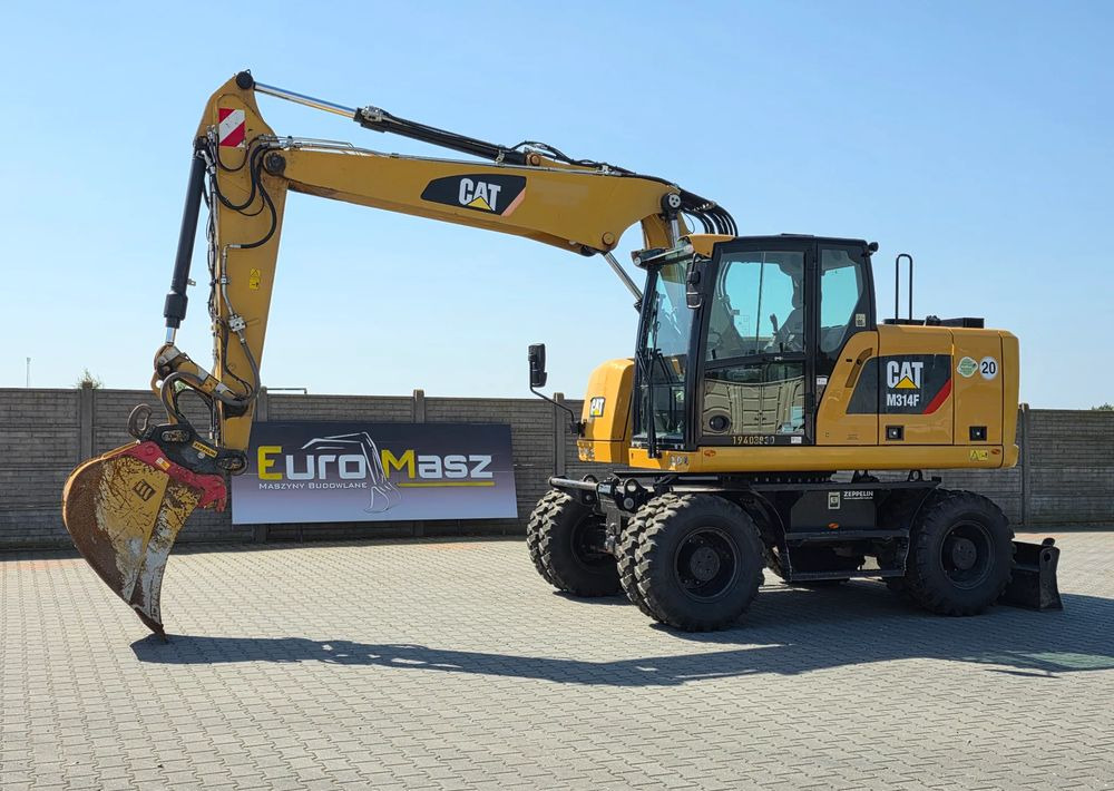 Caterpillar M314F, 2019 ROK, 3300 MTH, OIL QUICK OQ 65 - Tekerlekli ekskavatör: fotoğraf 1 Caterpillar M314F, 2019 ROK, 3300 MTH, OIL QUICK OQ 65 - Tekerlekli ekskavatör: fotoğraf 1