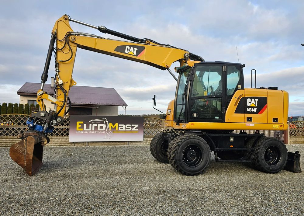 Caterpillar M314F, 2019 ROK, 5600 MTH, GŁOWICA SMP - Tekerlekli ekskavatör: fotoğraf 1 Caterpillar M314F, 2019 ROK, 5600 MTH, GŁOWICA SMP - Tekerlekli ekskavatör: fotoğraf 1