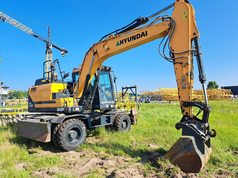 Hyundai HW140 - Tekerlekli ekskavatör: fotoğraf 2 Hyundai HW140 - Tekerlekli ekskavatör: fotoğraf 2