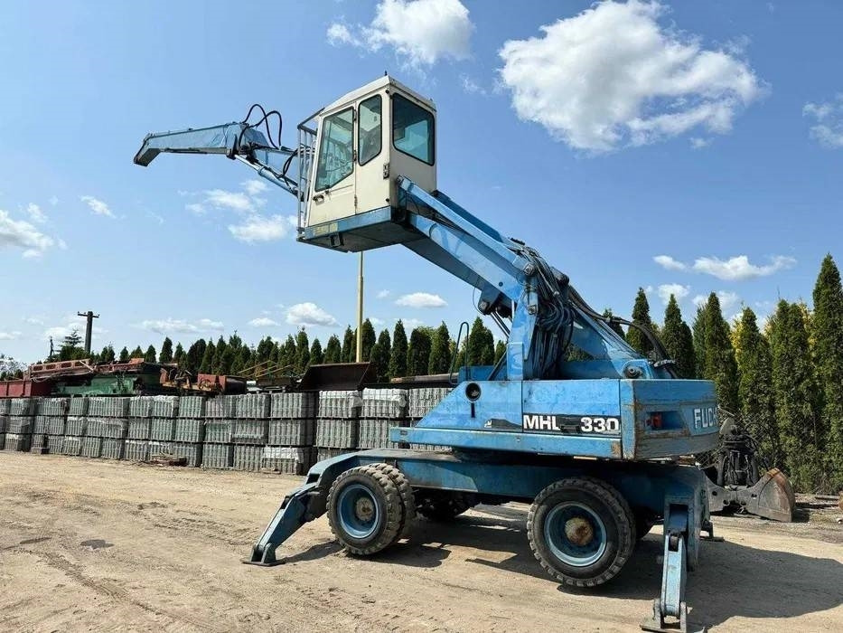 Koparka przeładunkowa Fuchs MHL 330 - Elleçleme makinesi: fotoğraf 2 Koparka przeładunkowa Fuchs MHL 330 - Elleçleme makinesi: fotoğraf 2