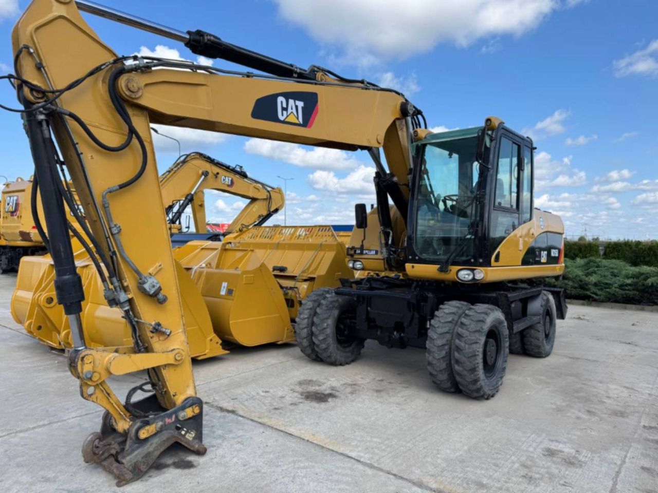 CAT M315D - Tekerlekli ekskavatör: fotoğraf 1 CAT M315D - Tekerlekli ekskavatör: fotoğraf 1