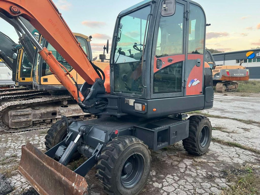 Doosan S55W-V Plus, 4800hours - Tekerlekli ekskavatör: fotoğraf 2 Doosan S55W-V Plus, 4800hours - Tekerlekli ekskavatör: fotoğraf 2