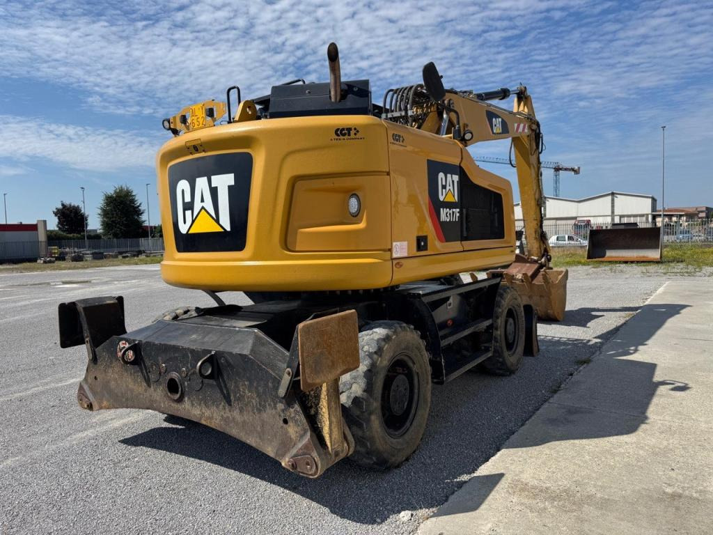 Caterpillar M317F - Tekerlekli ekskavatör: fotoğraf 3 Caterpillar M317F - Tekerlekli ekskavatör: fotoğraf 3
