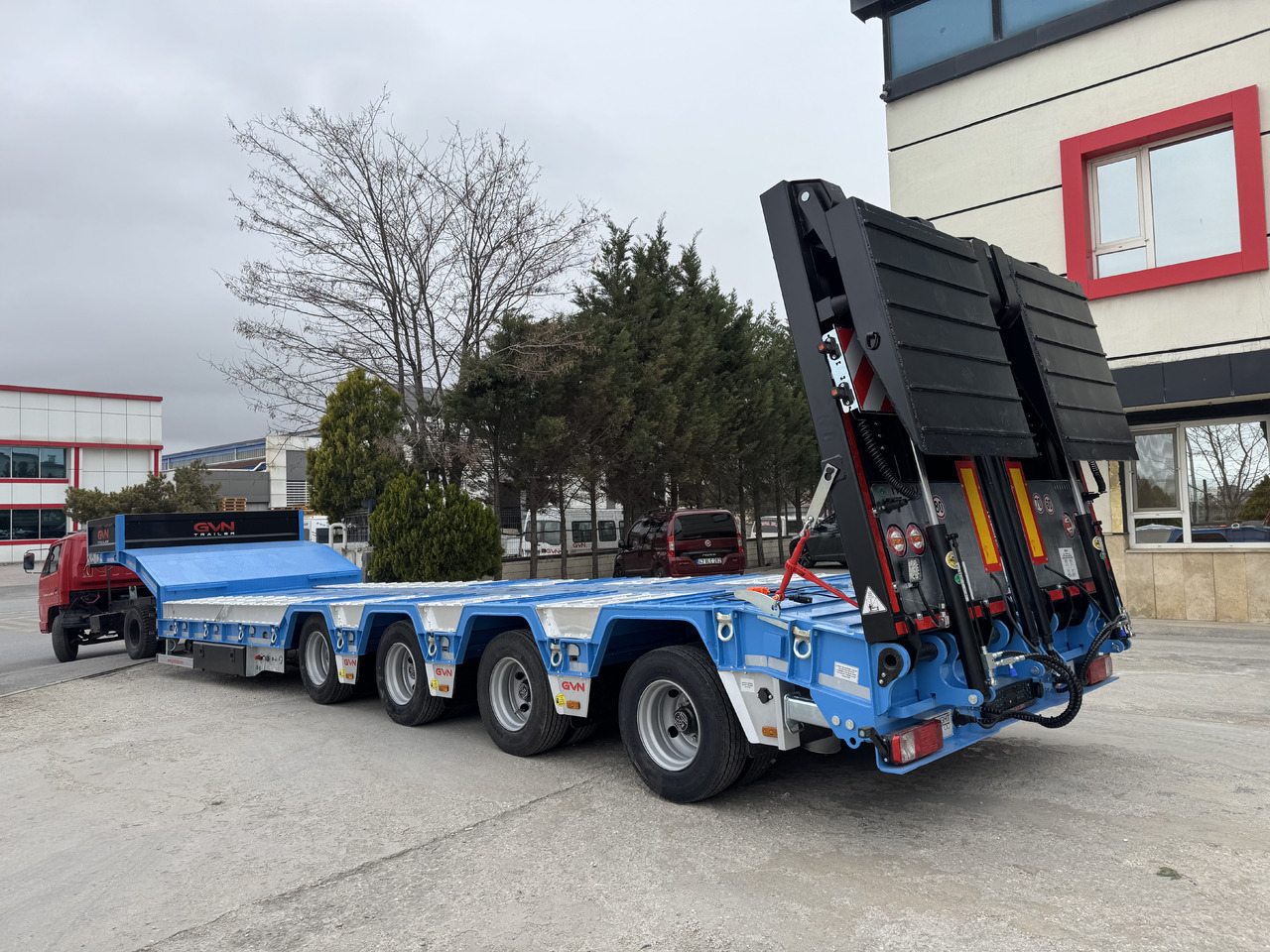 GVN Trailer 4 AXLE LOWBED WITH WHEEL RECESSES - Alçak çerçeveli platform dorse: fotoğraf 1 GVN Trailer 4 AXLE LOWBED WITH WHEEL RECESSES - Alçak çerçeveli platform dorse: fotoğraf 1