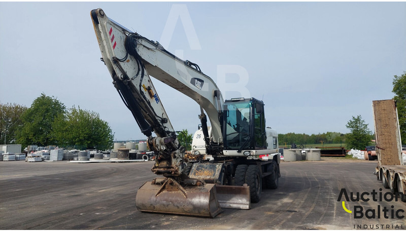 Caterpillar M 322 D - Tekerlekli ekskavatör: fotoğraf 1 Caterpillar M 322 D - Tekerlekli ekskavatör: fotoğraf 1