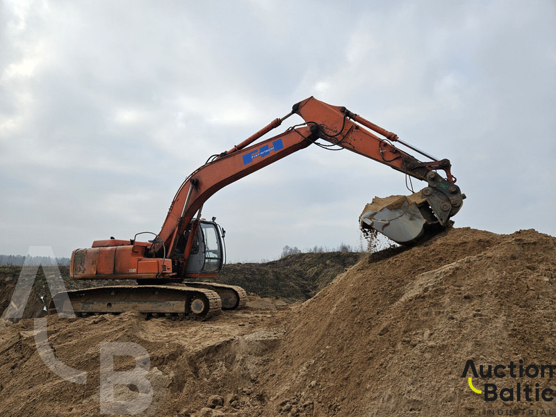 Hitachi EX 215 - Paletli ekskavatör: fotoğraf 1 Hitachi EX 215 - Paletli ekskavatör: fotoğraf 1