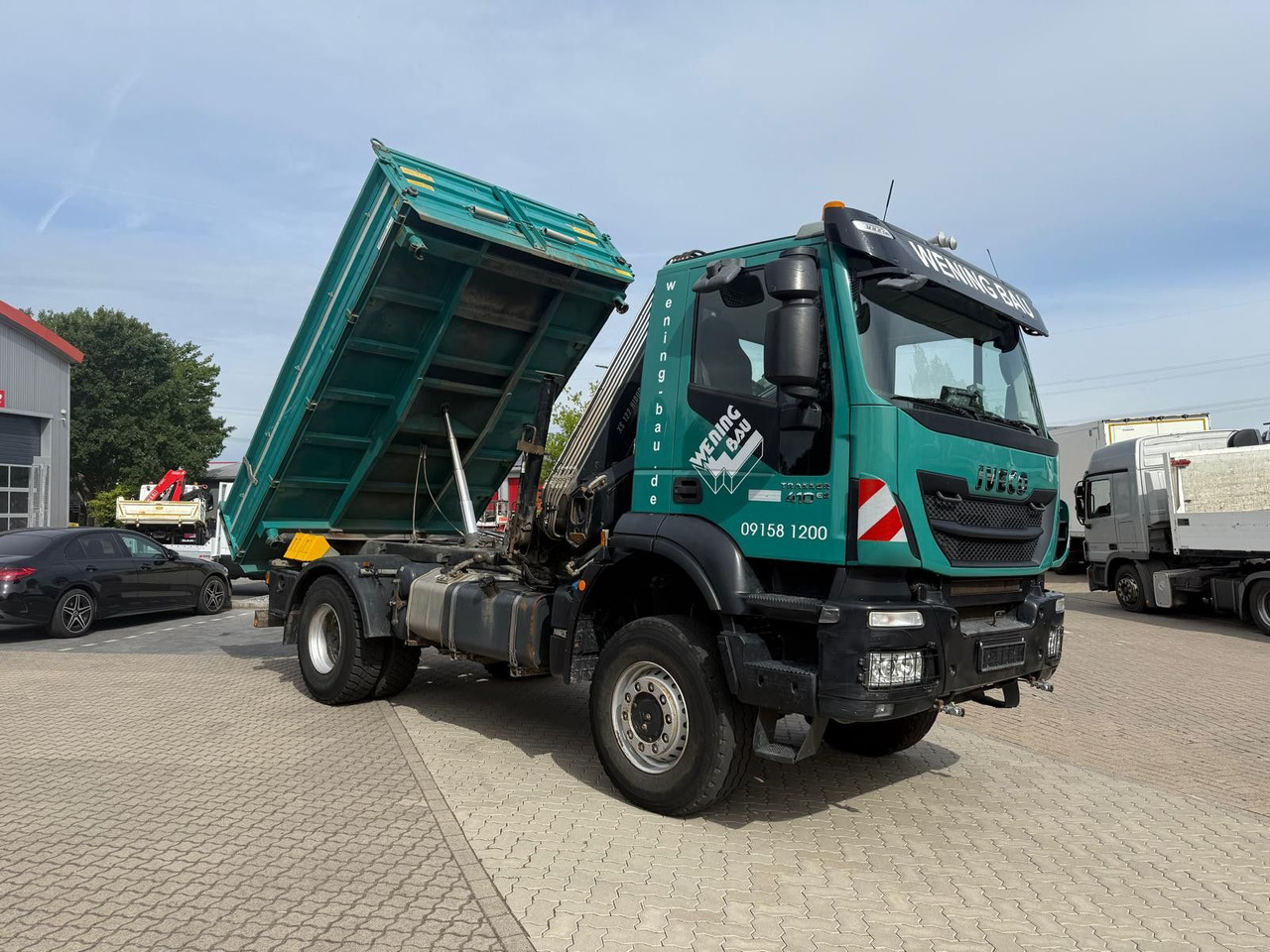 Iveco AD190 T/W Trakker 410 4x4 Allrad Kran KipperHIAB - Damperli kamyon, Vinçli kamyon: fotoğraf 2 Iveco AD190 T/W Trakker 410 4x4 Allrad Kran KipperHIAB - Damperli kamyon, Vinçli kamyon: fotoğraf 2