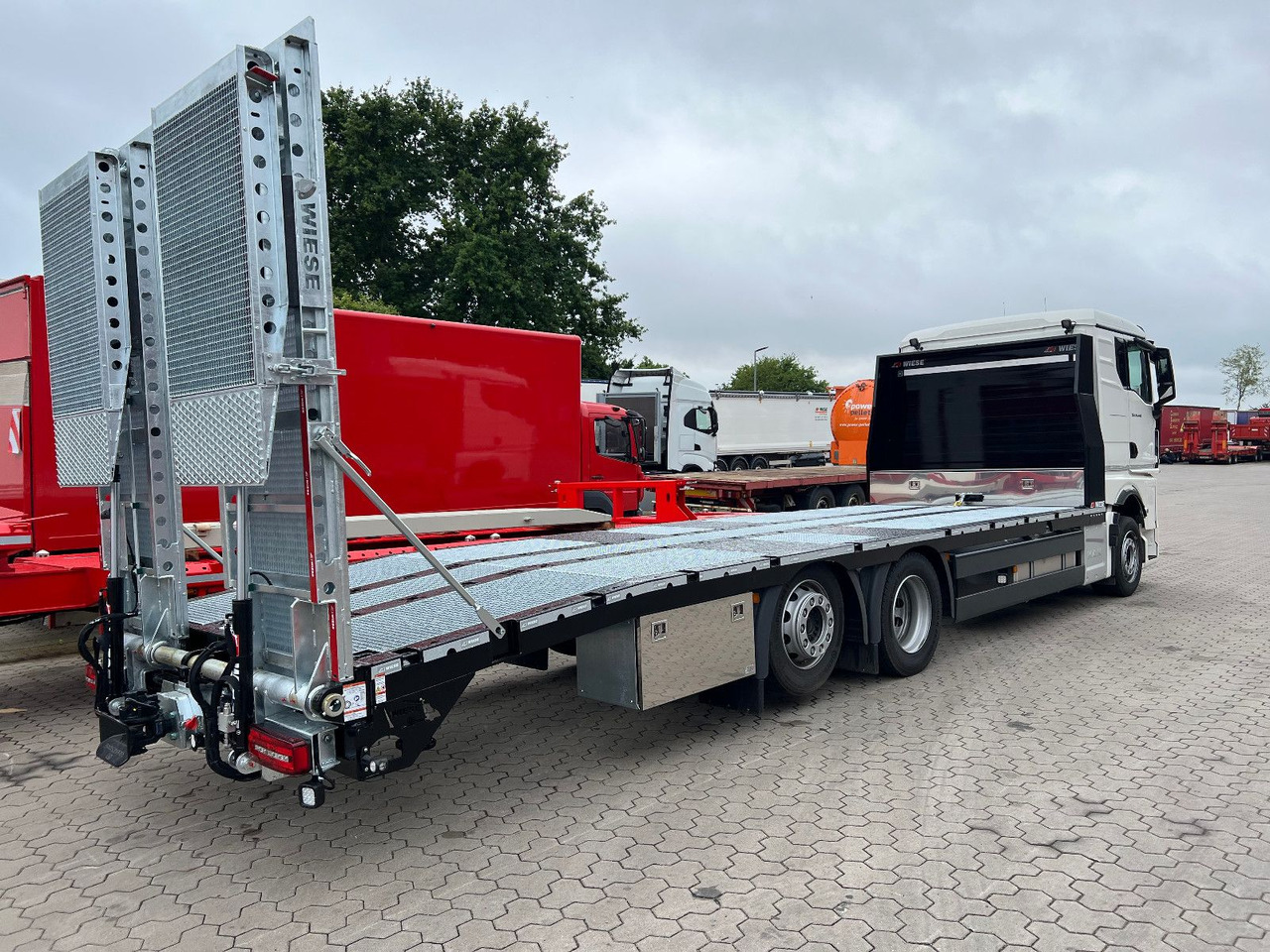 MAN Baumaschinen-  Arbeitsbühnentransporter Rampen - Çekici kamyonu: fotoğraf 5 MAN Baumaschinen-  Arbeitsbühnentransporter Rampen - Çekici kamyonu: fotoğraf 5