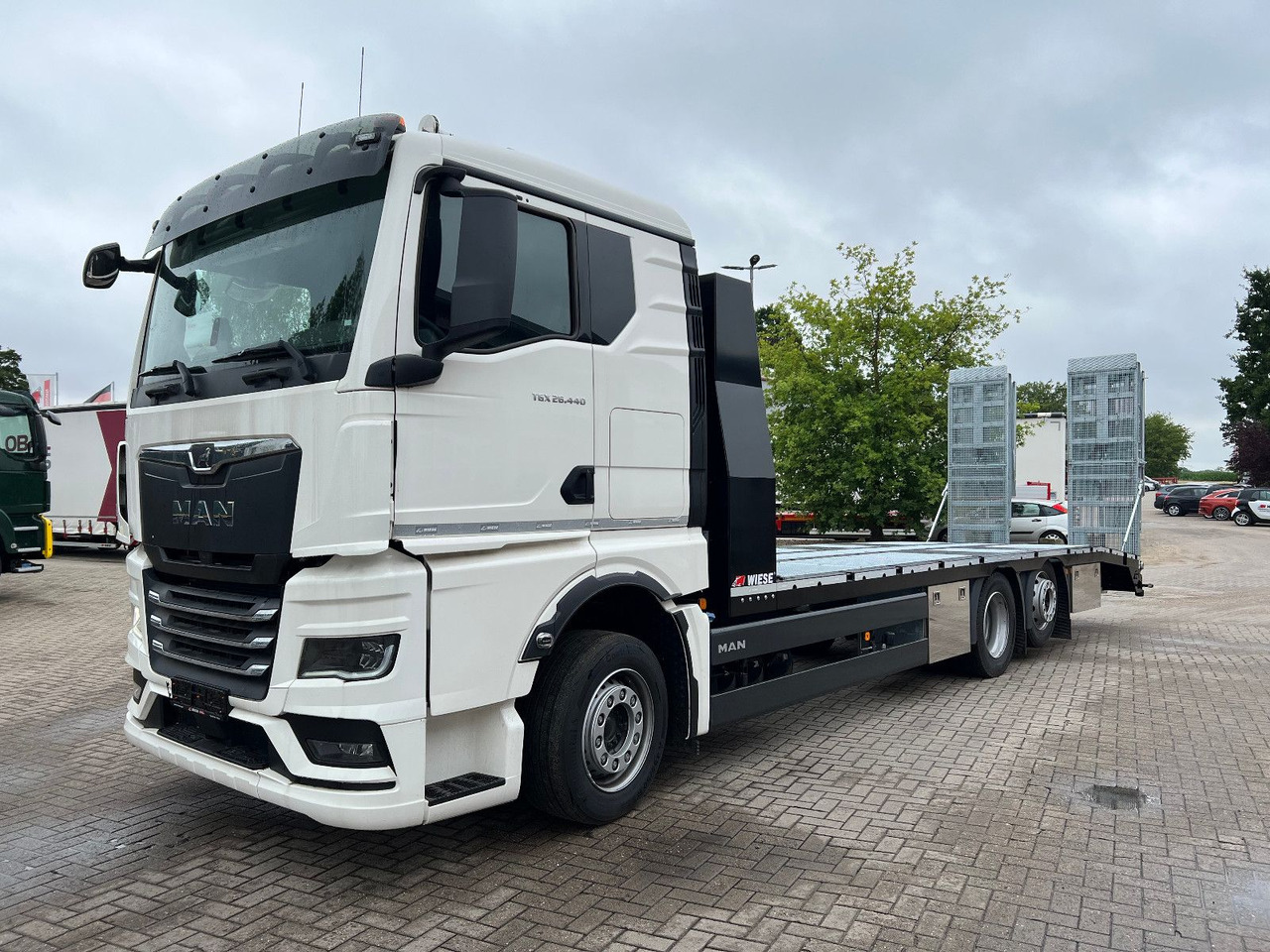 MAN Baumaschinen-  Arbeitsbühnentransporter Rampen - Çekici kamyonu: fotoğraf 3 MAN Baumaschinen-  Arbeitsbühnentransporter Rampen - Çekici kamyonu: fotoğraf 3