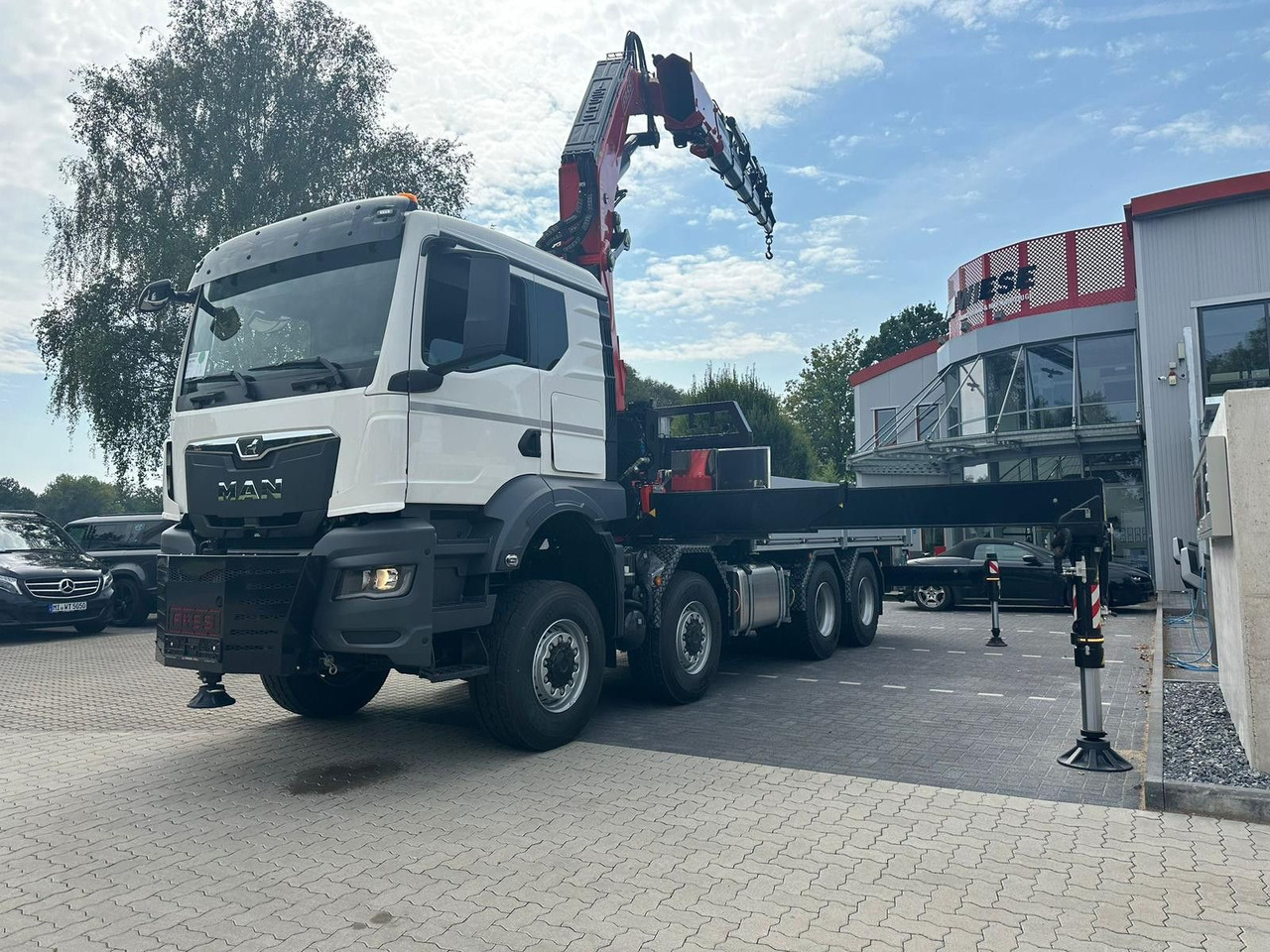 MAN TGS 41.520 8x8 mit Fassi Ladekran F710RA.2.26 - Sal/ Açık kasa kamyon: fotoğraf 2 MAN TGS 41.520 8x8 mit Fassi Ladekran F710RA.2.26 - Sal/ Açık kasa kamyon: fotoğraf 2
