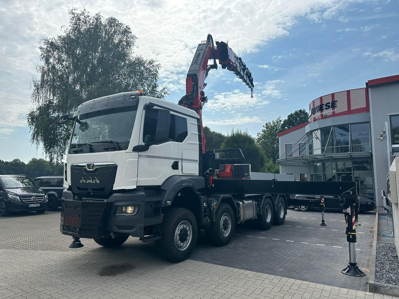 MAN TGS 41.520 8x8 mit Fassi Ladekran F710RA.2.26 - Vinçli kamyon: fotoğraf 2 MAN TGS 41.520 8x8 mit Fassi Ladekran F710RA.2.26 - Vinçli kamyon: fotoğraf 2