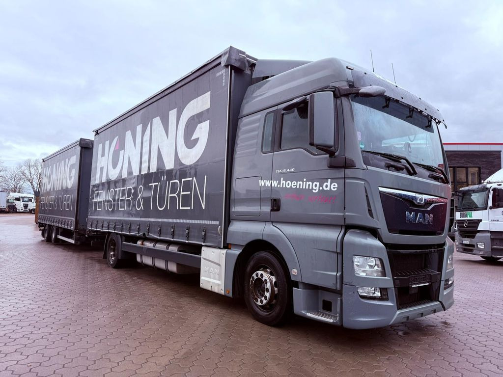 MAN TGX 18.440 LL Volumen LKW mit Staplerhalterung - Tenteli kamyon: fotoğraf 2 MAN TGX 18.440 LL Volumen LKW mit Staplerhalterung - Tenteli kamyon: fotoğraf 2